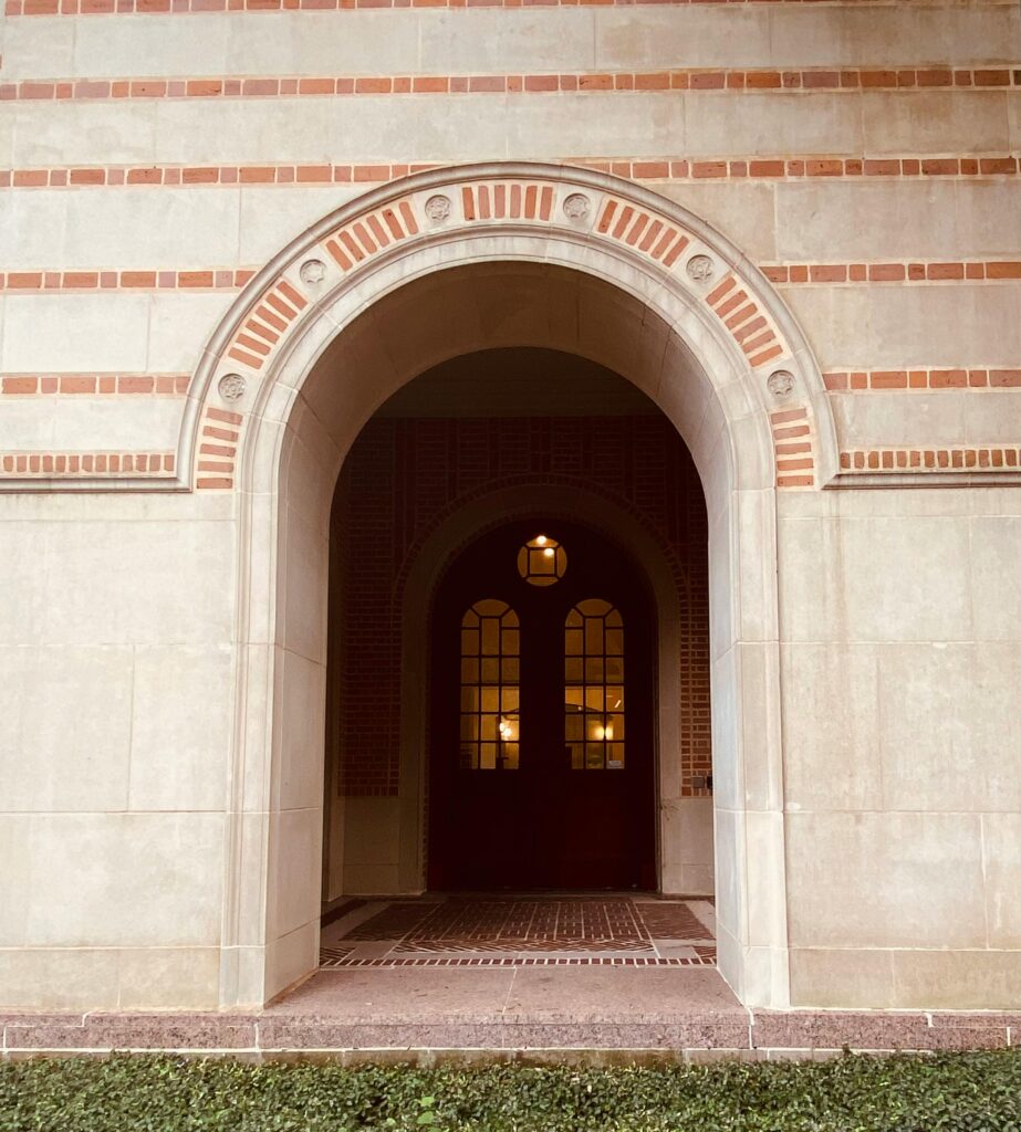 A classic arched doorway at Rice University's iconic architecture in Houston, Texas.